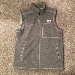 Gray North Face vest.